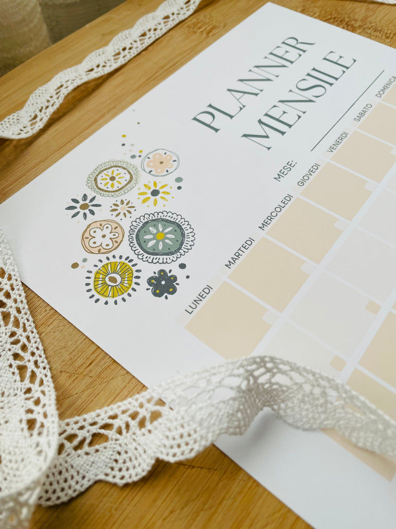 Handcrafted-style printable monthly calendar for 2025, designed by Manulu Studio.